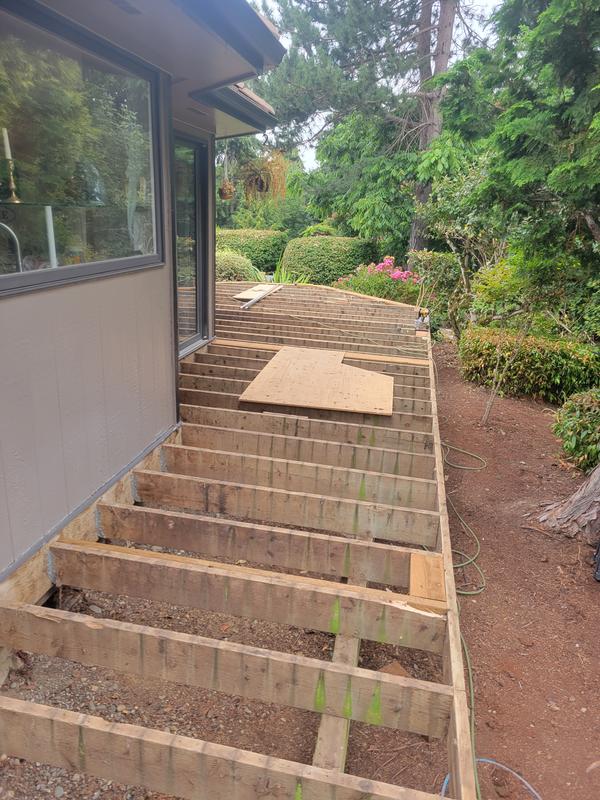 I dont have any direct pictures of me using the tool because i work alone but this was very useful for getting lags and SDS screws in tight spaces.  Just found that it lacked the torque needed to drive home the bigger lags.