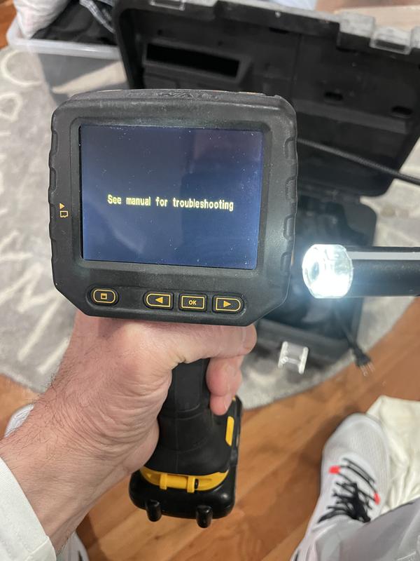 Screen displaying error code upon turning camera on.  Screen and battery are fully charged.  Does not work!