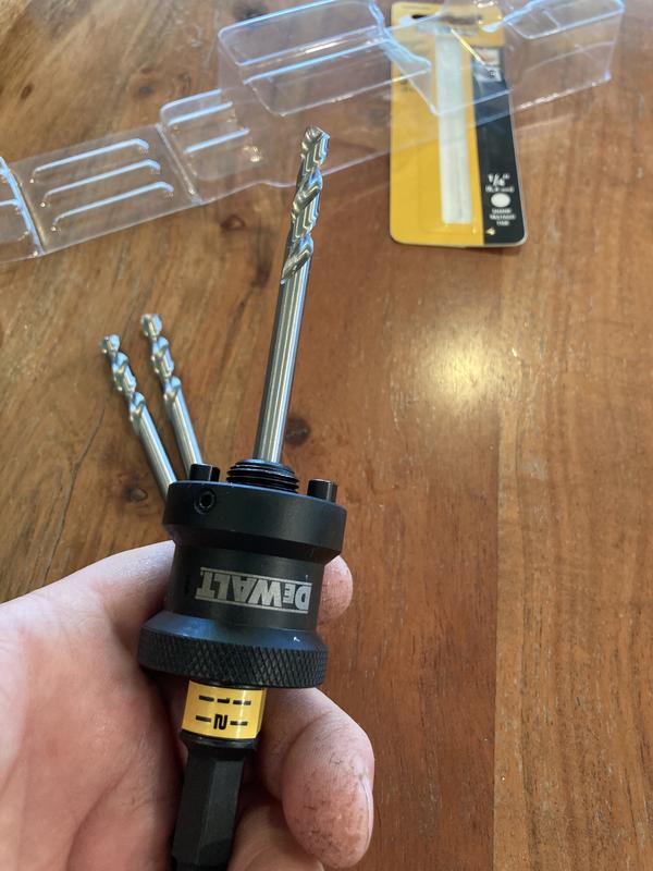 Slide collar back up to full locked position. This is the position that locks the pins into the base of the hole saw to keep it from tightening up