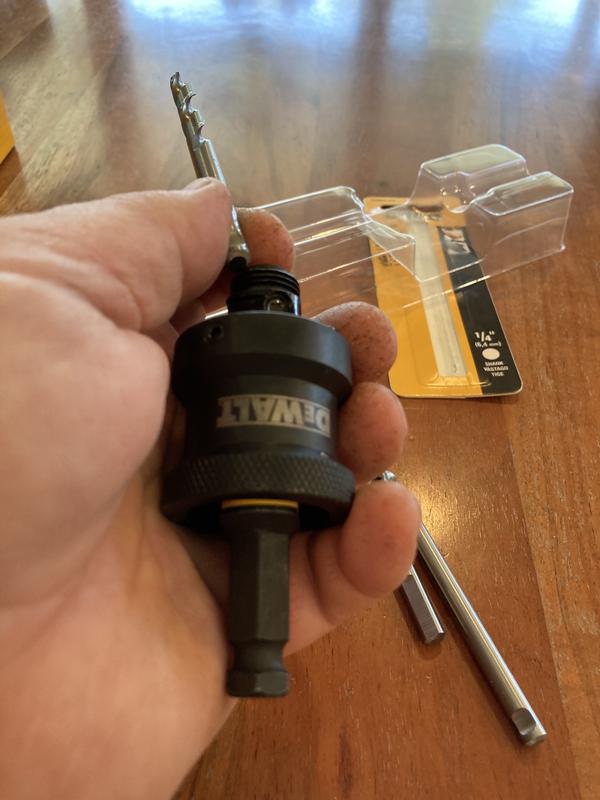 Shown in position 2, ready to switch out pilot bits. Bit can be changed with hole saw in place