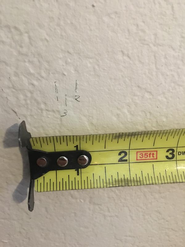 Tight grouping of locates, tape measure provided for scale