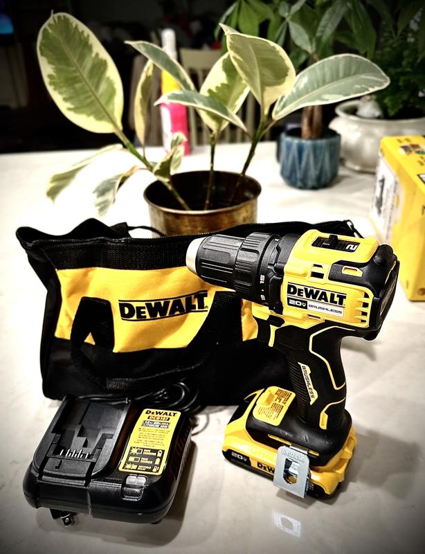 The kit includes a 2AH battery and compact charger