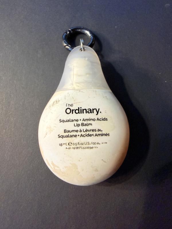 Customer photo for "I adore the product, but hate the container."