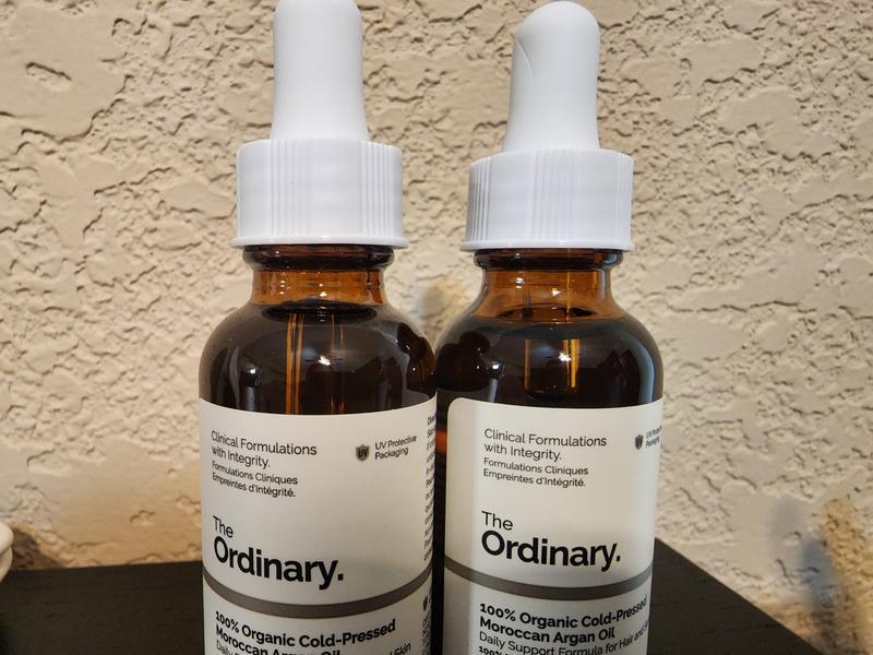 Customer photo for "One of My Argan oil bottle was opened!"