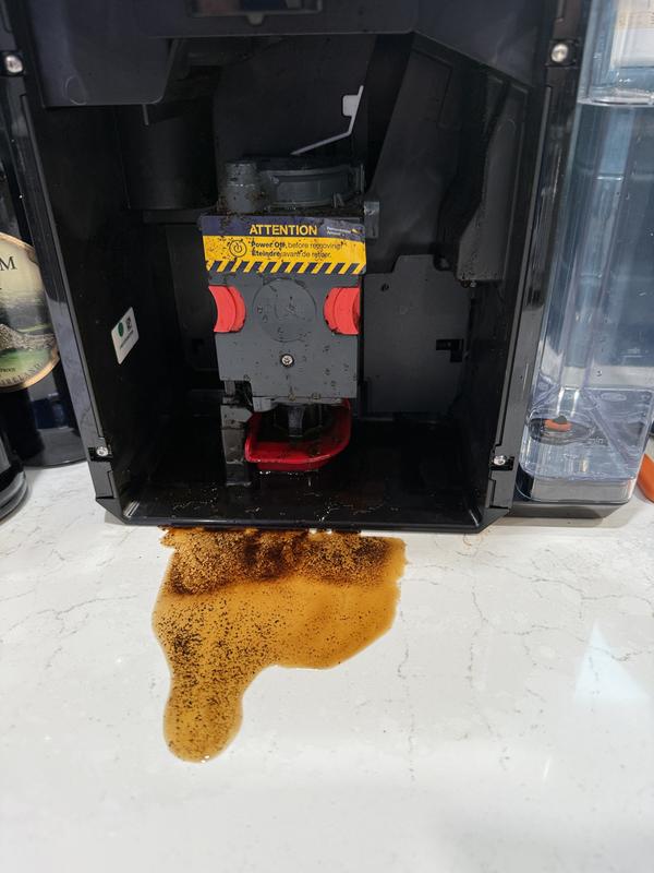 Internal failure causing coffee to come out everywhere except the cup.