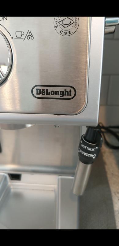 Dripping right under DeLonghi label