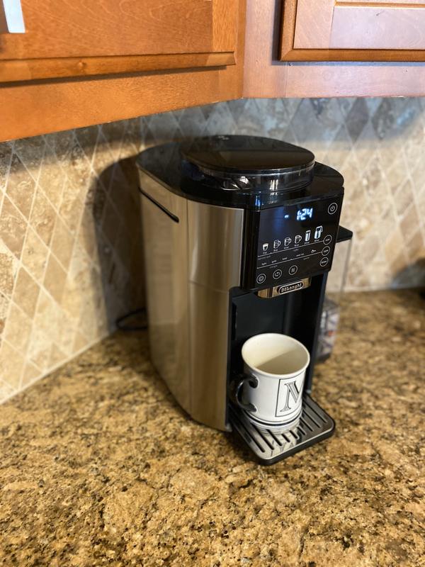 Yeti 20 oz Cup - I normally run my pods twice to get more coffee (yet not  as strong). This yeti 20 oz cup doesn't overfill and fits the height  requirement (although