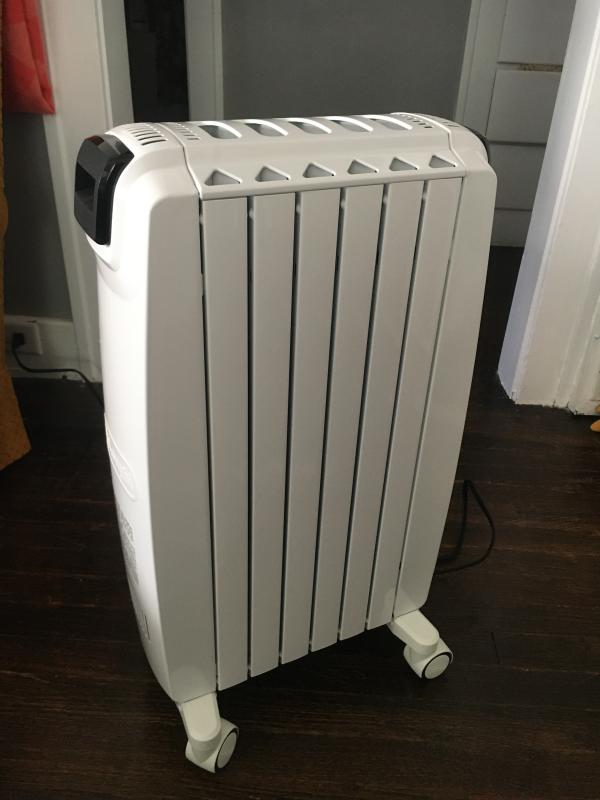A Delonghi Dragon 4 Pro oil filled radiator (213) * This lot is subject to  VAT