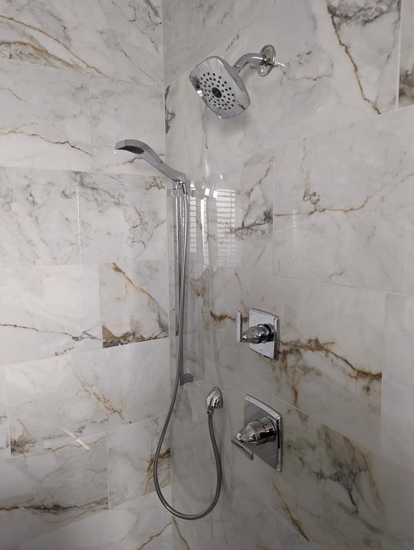 Delta shower system with useless hand-held