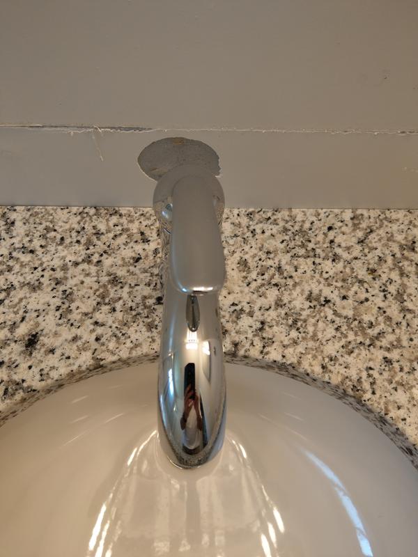 handle asymmetrically positioned in off position