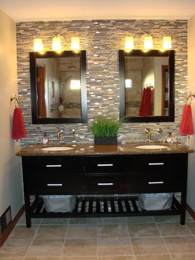 Vanity wall with wall mounted lavatory faucets