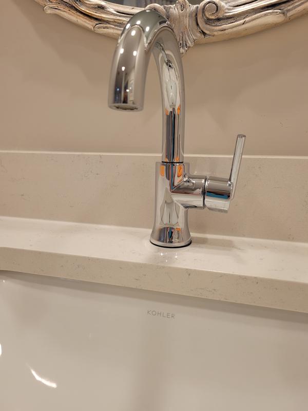 Leaky Trinsic faucet in our guest bath. Vanity is now water damaged.