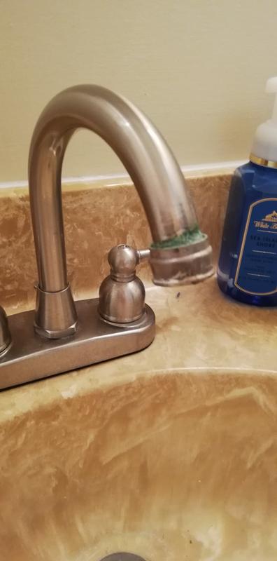 Old yucky faucet that we replaced