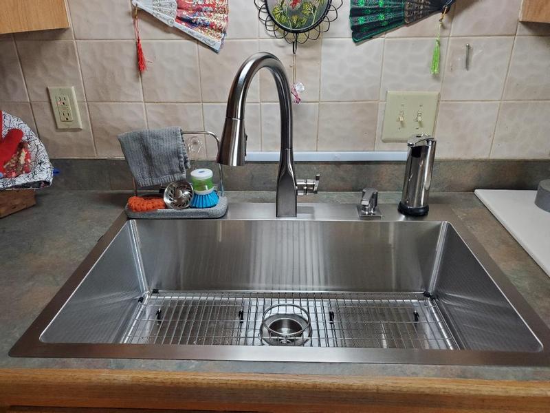 My beautiful sink,faucet and soap dispenser. The other dispenser is not Delta but a cheap dispenser for hand sanitizer.