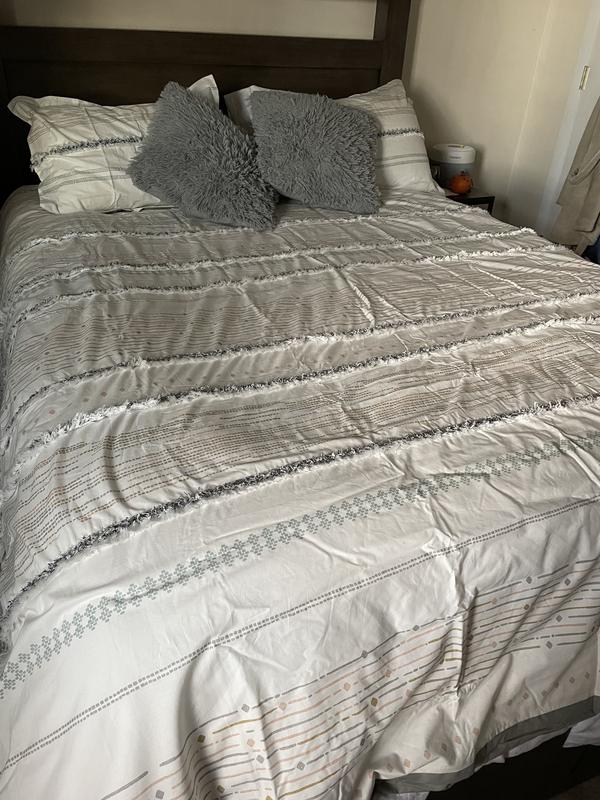 Bed made. Excuse the wrinkles from kids.