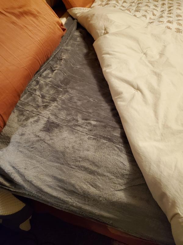 I've put it between quilt and top sheet.