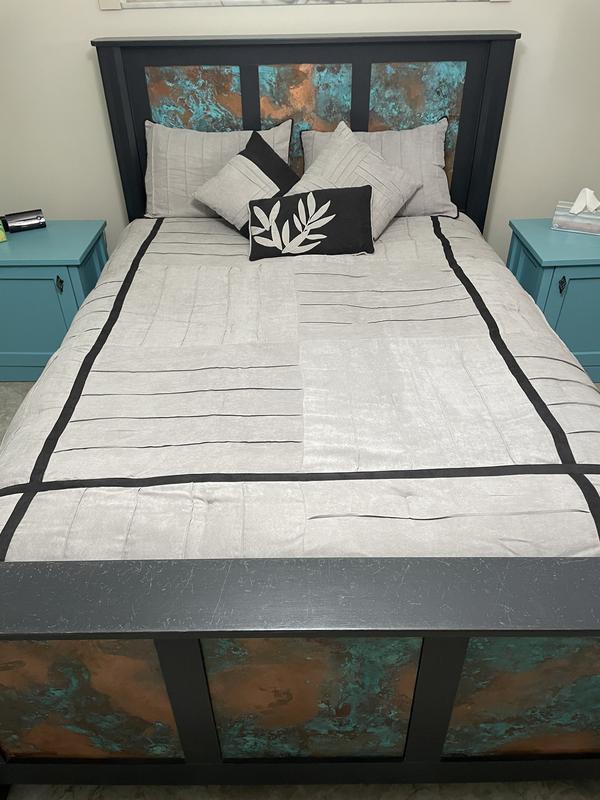 Comforter set on my bed.