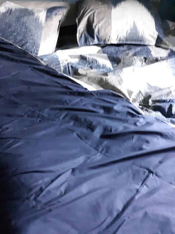 Alpine three-piece duvet cover mini set full / Queen Navy showing the front side and the reversible solid Dusty navy blue side