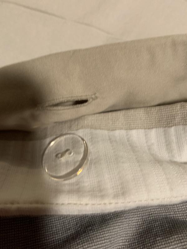 Buttons on the inside to hold it securely.