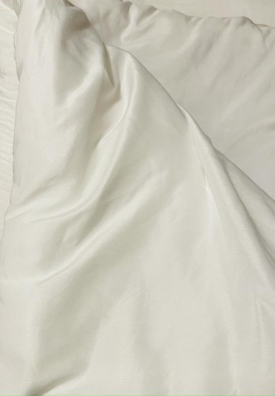 reversed side of the comforter.  Soft and satin.