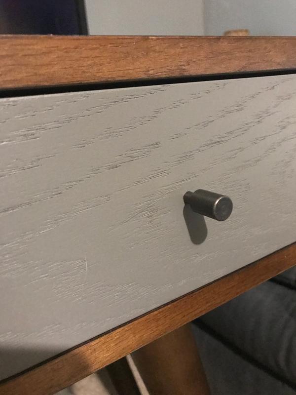 Close up of closed drawer and knobs