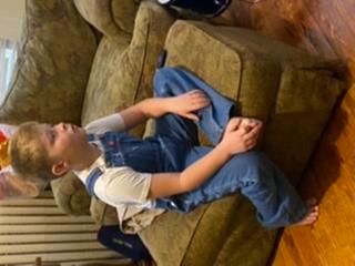 Focused on the tv but looks super cute