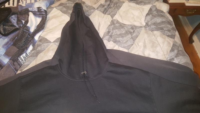 New smaller one under old one. Both are 2xl. Bottoms are touching.