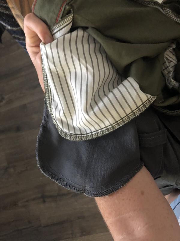 Front pocket of this item compared to side pocket of the men model: DuraTech Ranger Duck Cargo Pants (opening of the pockets are aligned)