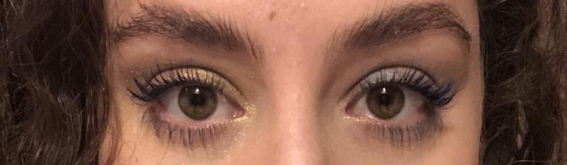 Blue mascara on both eyes.