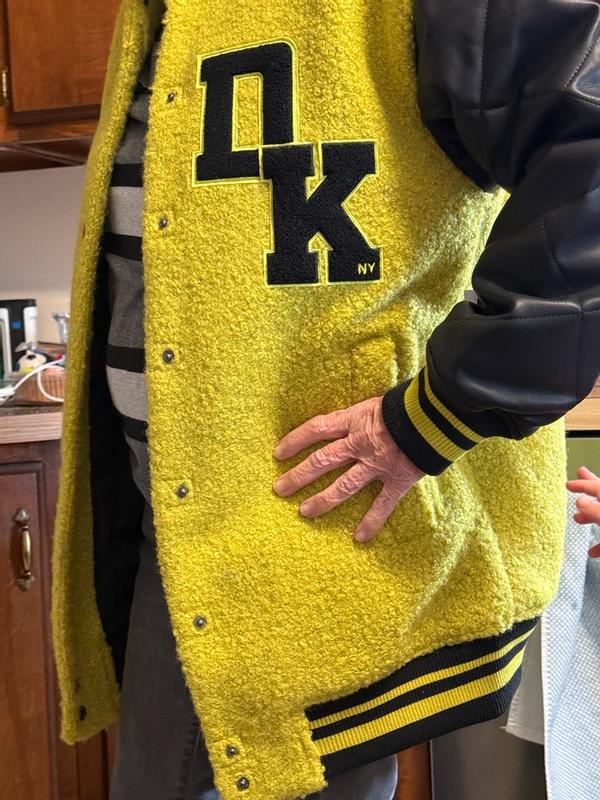 Customer photo for "Very nice jacket, but more green than I like."