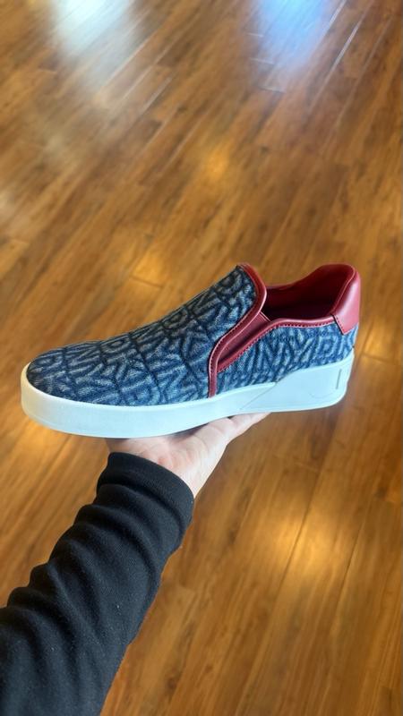 Customer photo for "Easy to slip on, provides height but feels slippery inside."