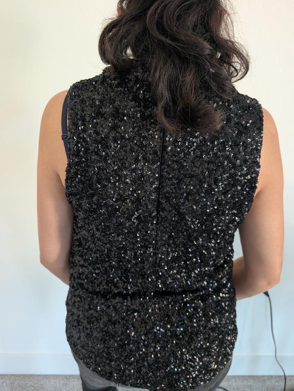 Customer photo for "Stunning, elegant top with comfortable fit."
