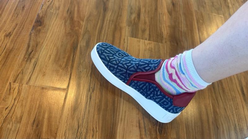 Customer photo for "Easy to slip on, provides height but feels slippery inside."