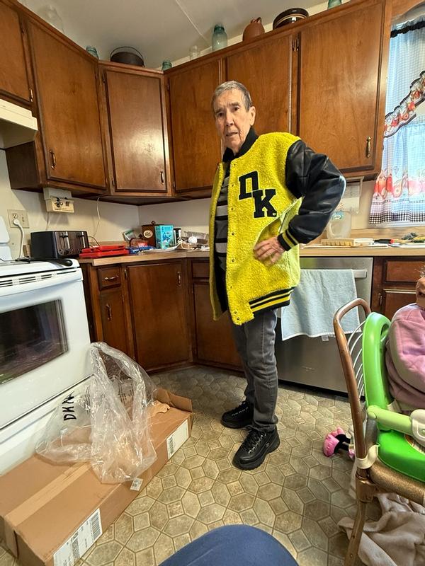 Customer photo for "Very nice jacket, but more green than I like."