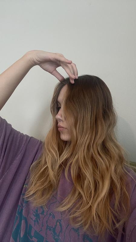 Brushing my hair makes it so frizzy, but it is so smooth after using this spray!