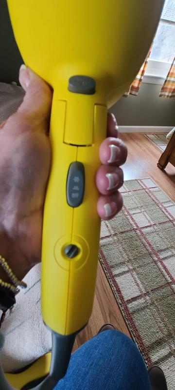 Customer photo for "Travel Hair Dryer Does The Trick"