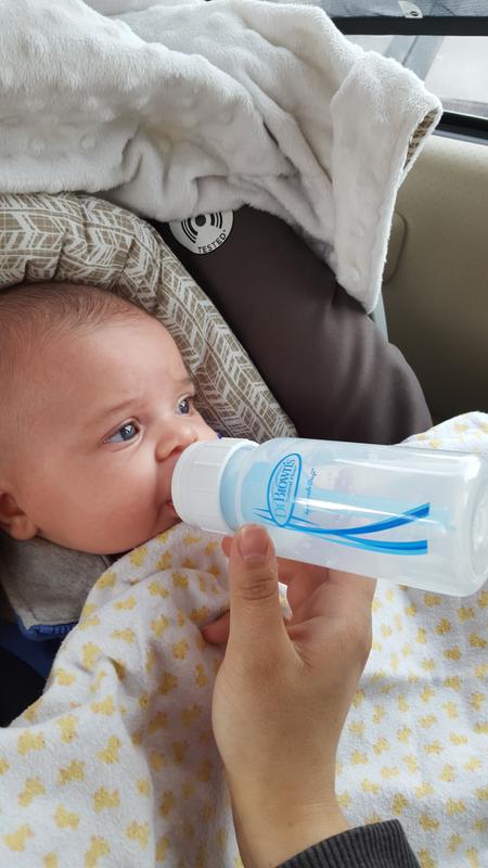 Showing off the new bottle to a friend!