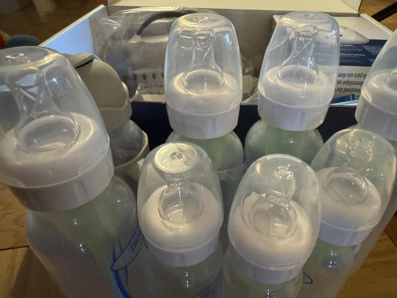 7 Bottles and a sippy bottle