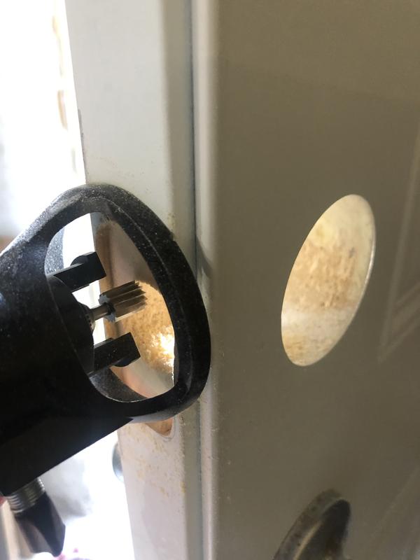 Using a Dremel attachment with cutting bit.