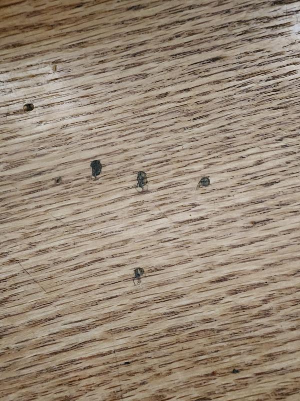 The top of my built-in desk that my daughter used as her desire to leave her name on everything