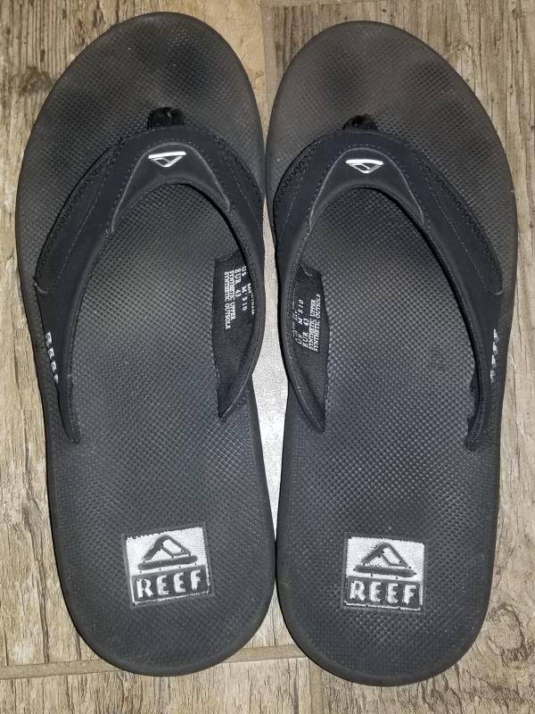 flip flops with can opener on bottom