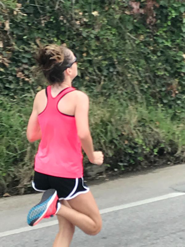 a girl wearing nike shorts