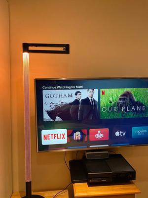 Dyson Light by the television, folded on itself