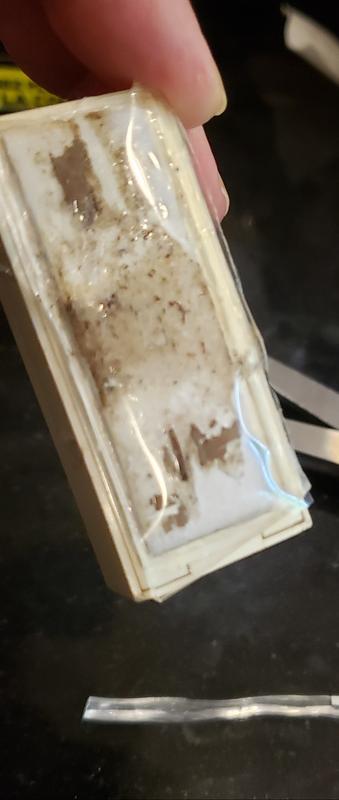 Put tape on back of doorbell after removing the old velcro.