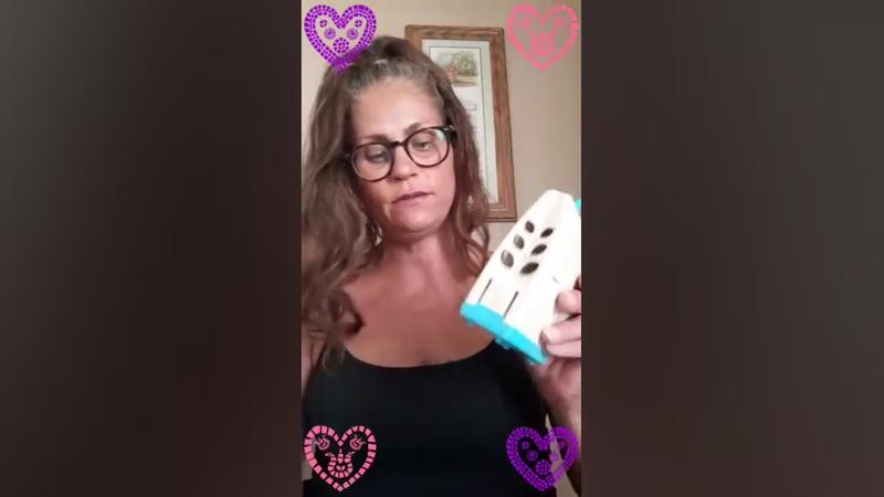 Me showing my Stay Away Pouch Pod to my family and friends