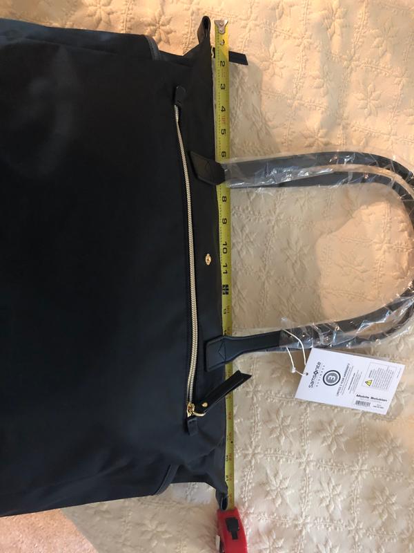 The 22 inch width is measured along the zipper and is not the width of the bag