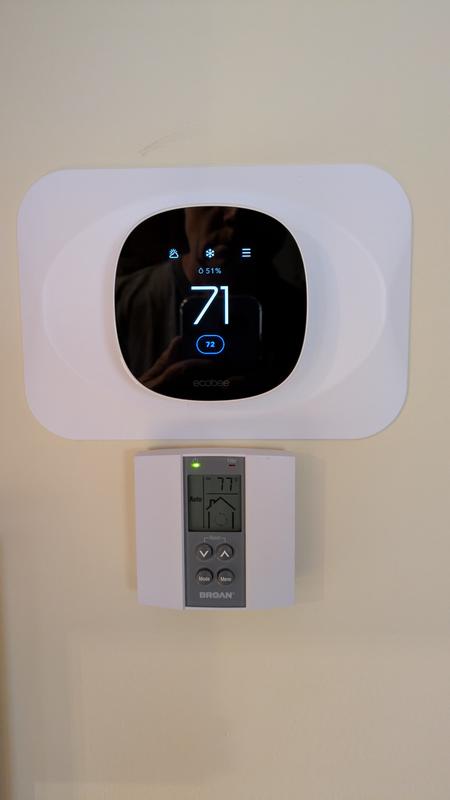 My installation with the extra back plate to cover the old holes in the wall.