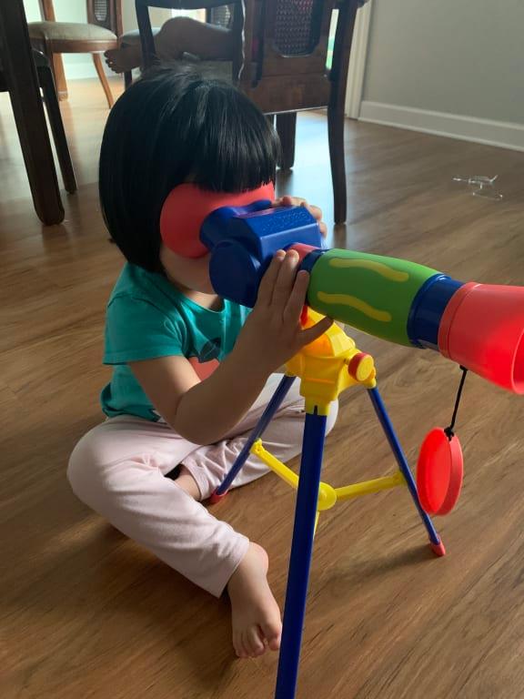 trying to be like her big sister