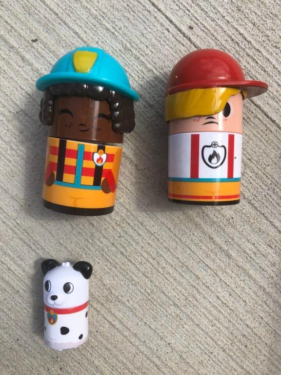 Cute dog and fire fighters
