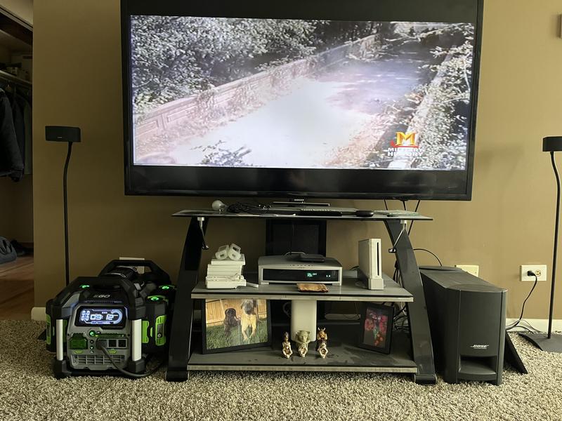 4 full batteries running 62” TV, wireless internet. Gauge shows 9 hours.